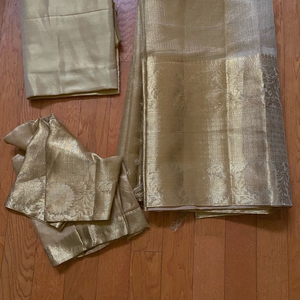 Full gold saree with blouse and shiny skirt